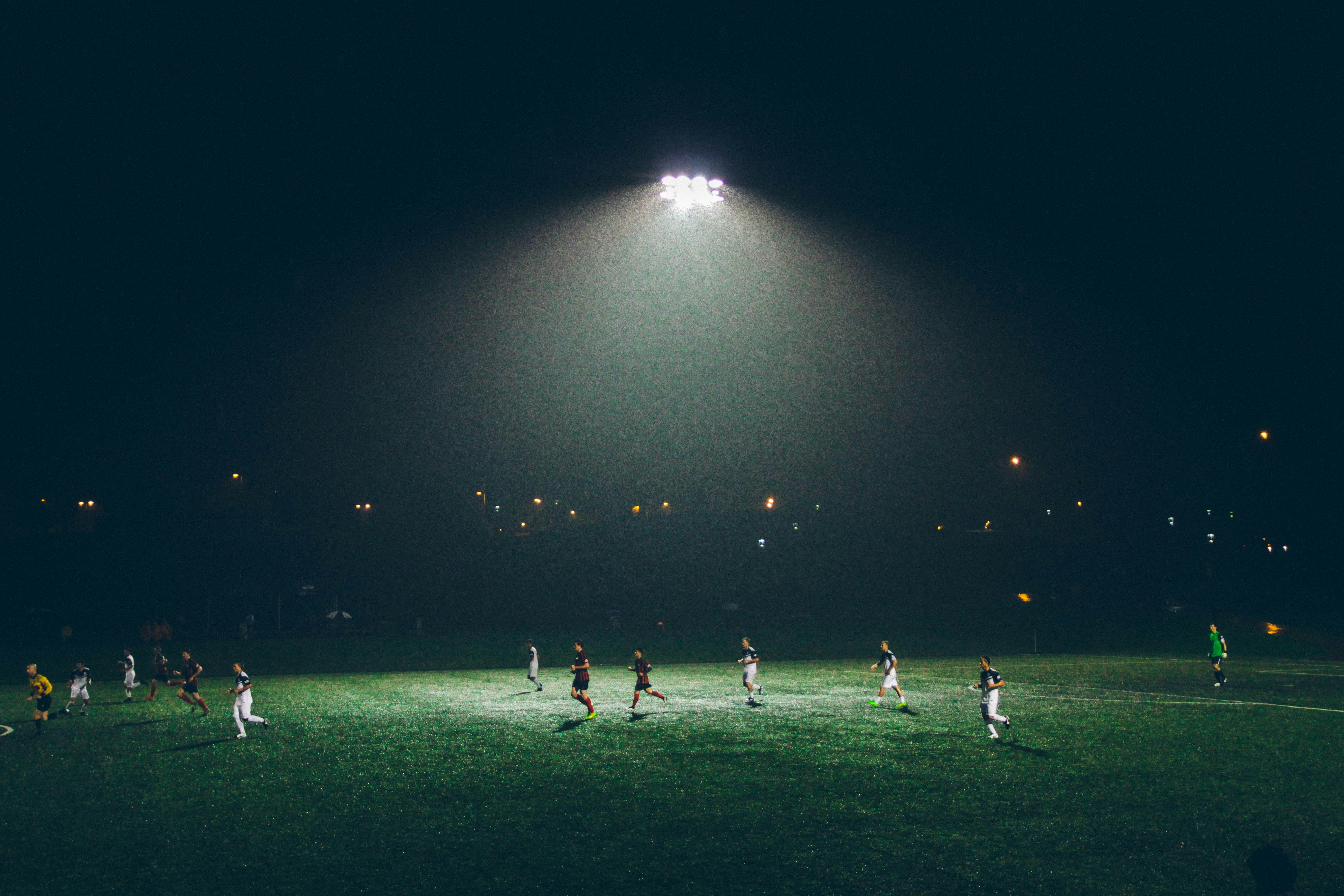 A Nepalese Athlete at Dusk on a Kathmandu Pitch
